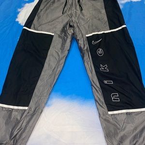 Nike swooshy pants
